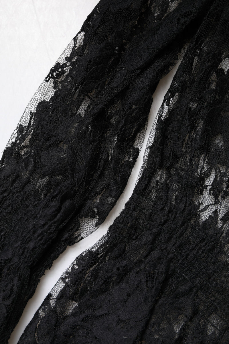 Black floral lace blouse sleeve and fabric detail