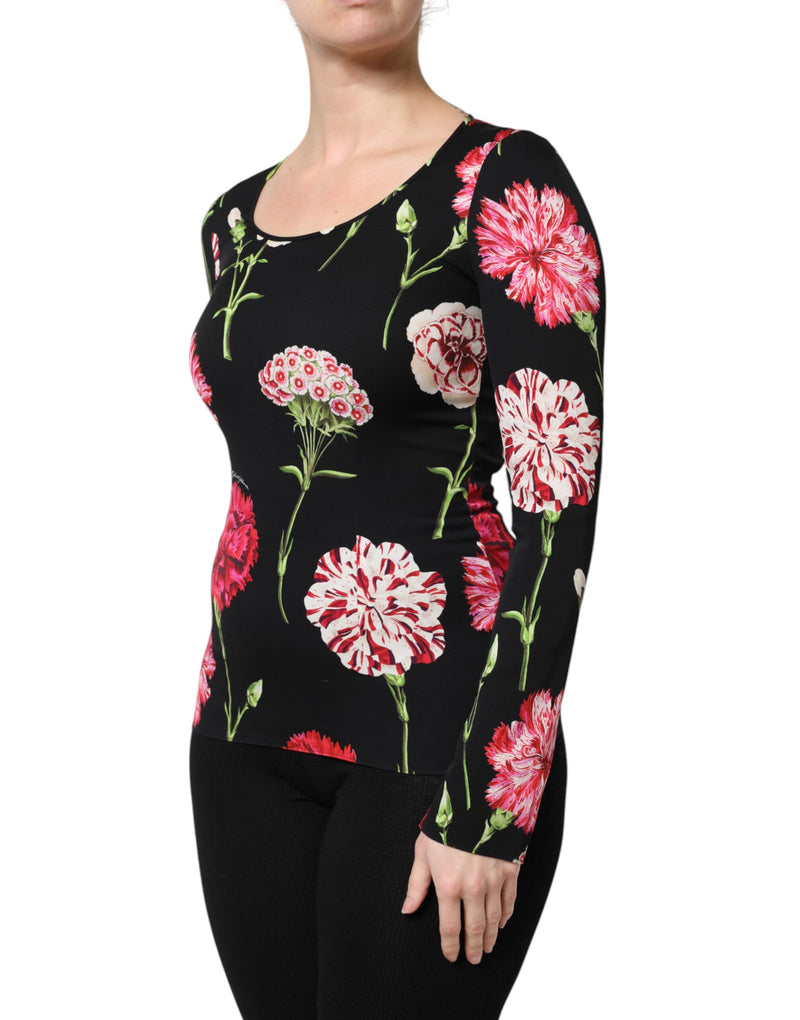 Black long sleeve blouse featuring a vibrant pink and white floral print with green stems
