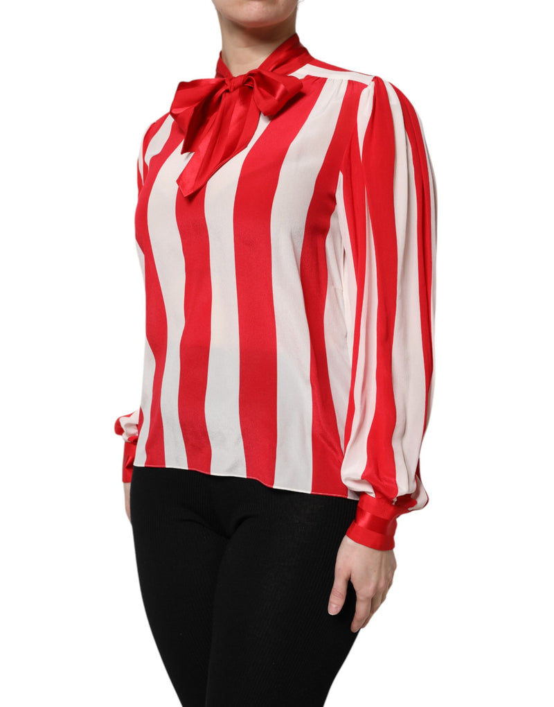 Red and white striped silk blouse featuring an ascot collar and long sleeves