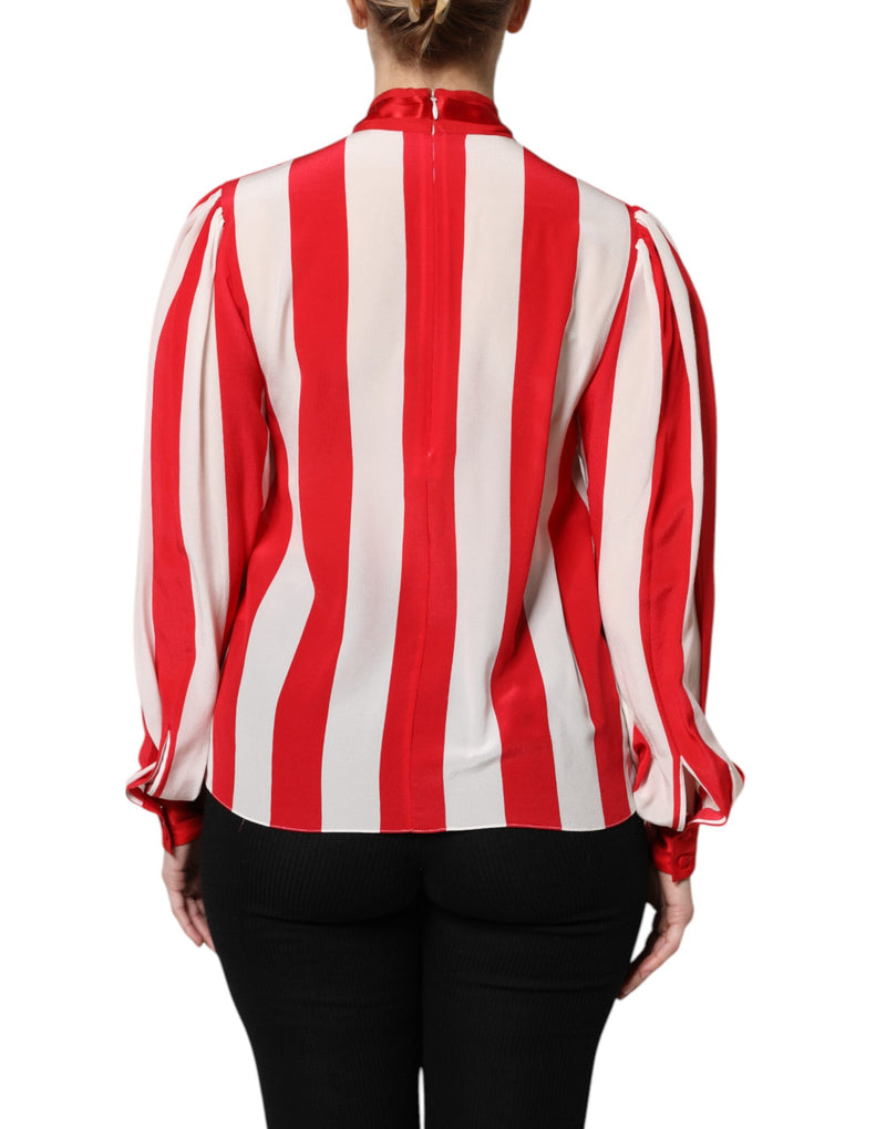 Red and white striped silk blouse with an ascot collar and long sleeves worn by a model from the back