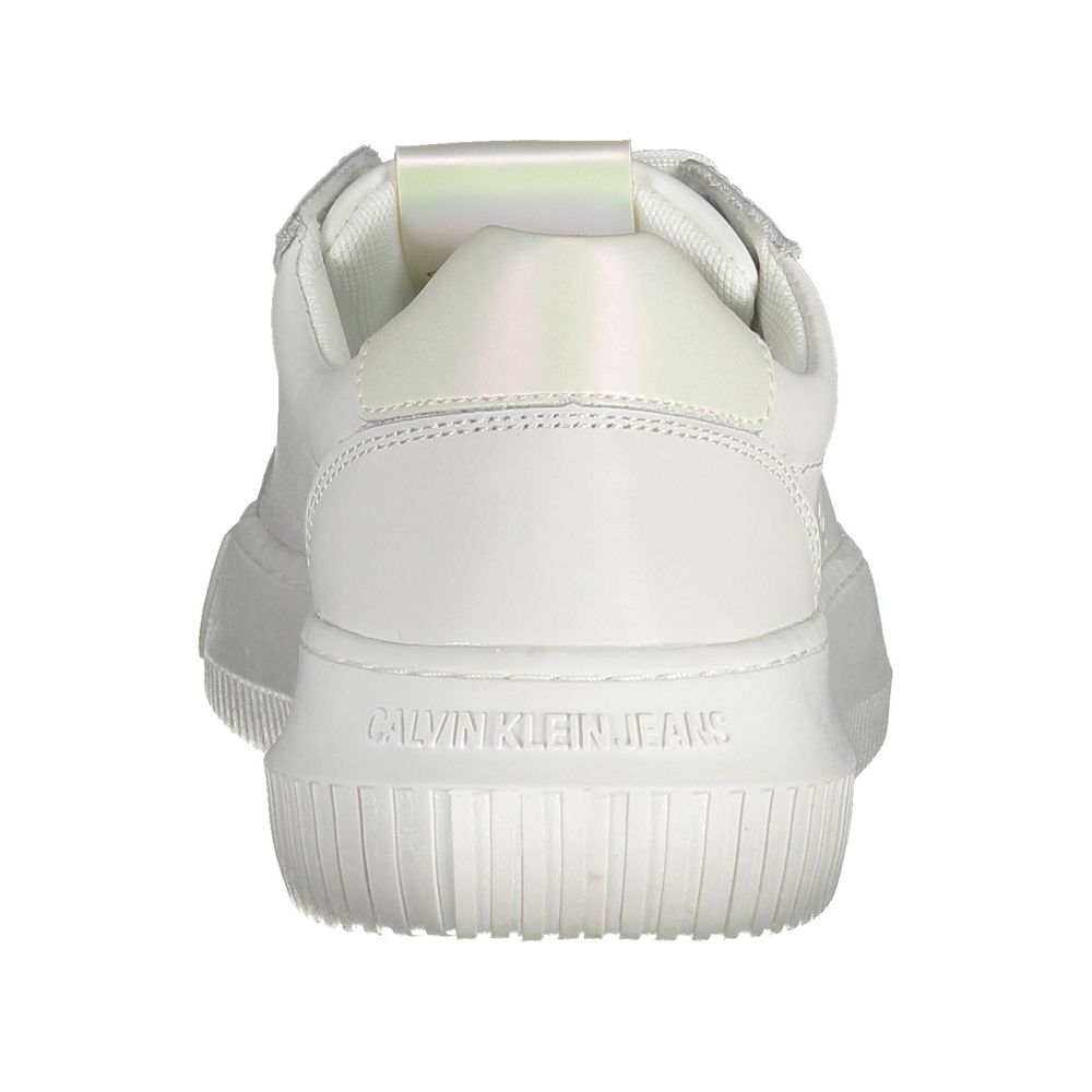 Back view of a white Calvin Klein leather sneaker with a chunky sole and iridescent heel tab detail.