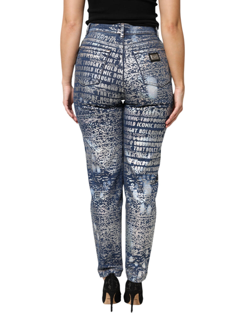 Blue washed high-waist denim jeans with allover metallic typography print viewed from the back