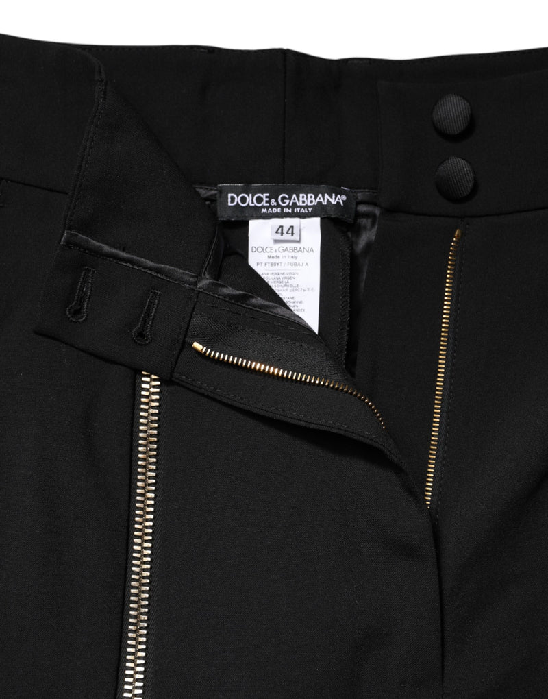 Black wool high-waist pants with gold zippers and Dolce and Gabbana brand label