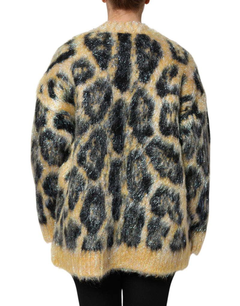 Fuzzy mohair crew neck sweater with a yellow and black leopard print pattern viewed from behind