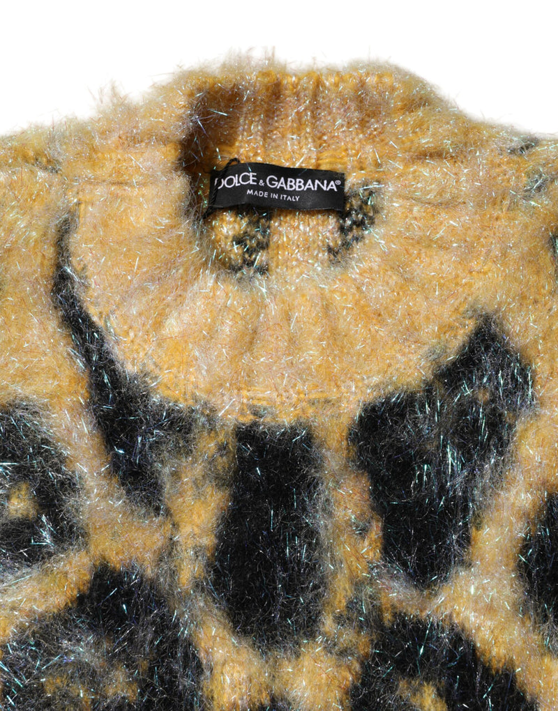 Close-up of a fuzzy multicolored leopard print mohair crew neck sweater with a Dolce & Gabbana tag