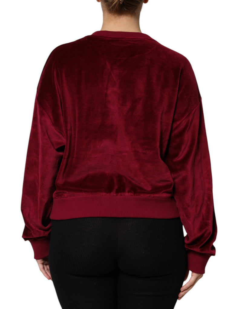 Red cotton velvet crew neck pullover sweater seen from the back
