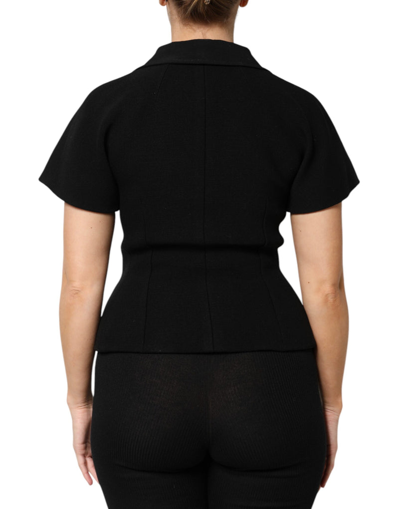 Black wool short-sleeve jacket with lapel collar worn from behind