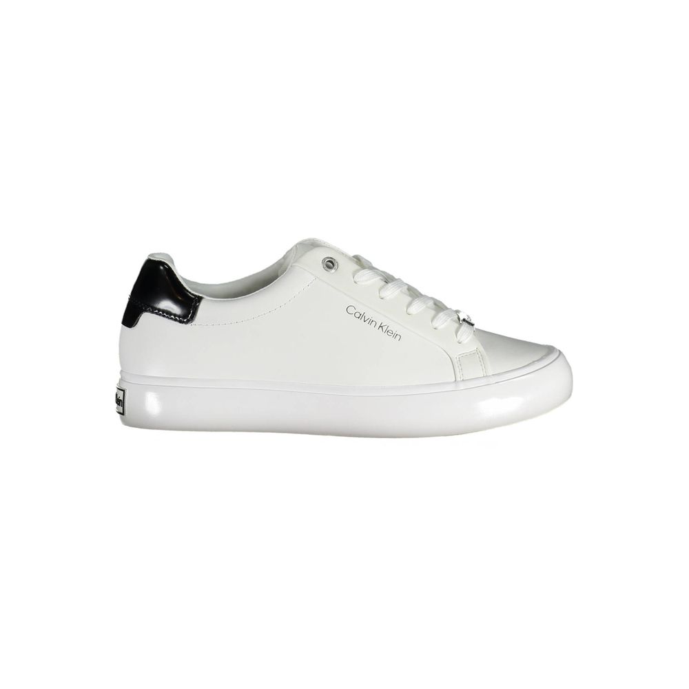 Calvin Klein white leather low-top sneaker with a black heel tab and white rubber sole.