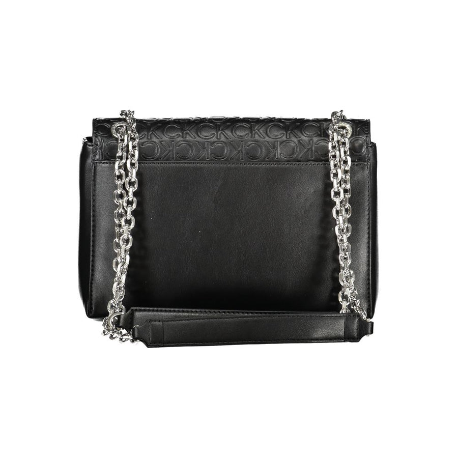 Black polyester Calvin Klein handbag with debossed CK monogram flap and silver hardware