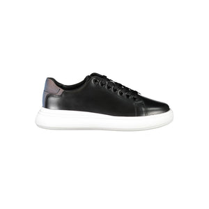Calvin Klein women’s black leather sneaker with a thick white platform sole and iridescent heel detail.