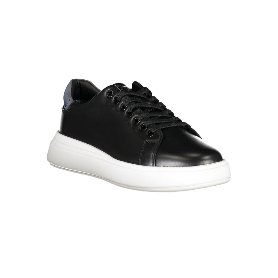 Calvin Klein women’s black leather sneaker with a thick white platform sole and iridescent heel detail.