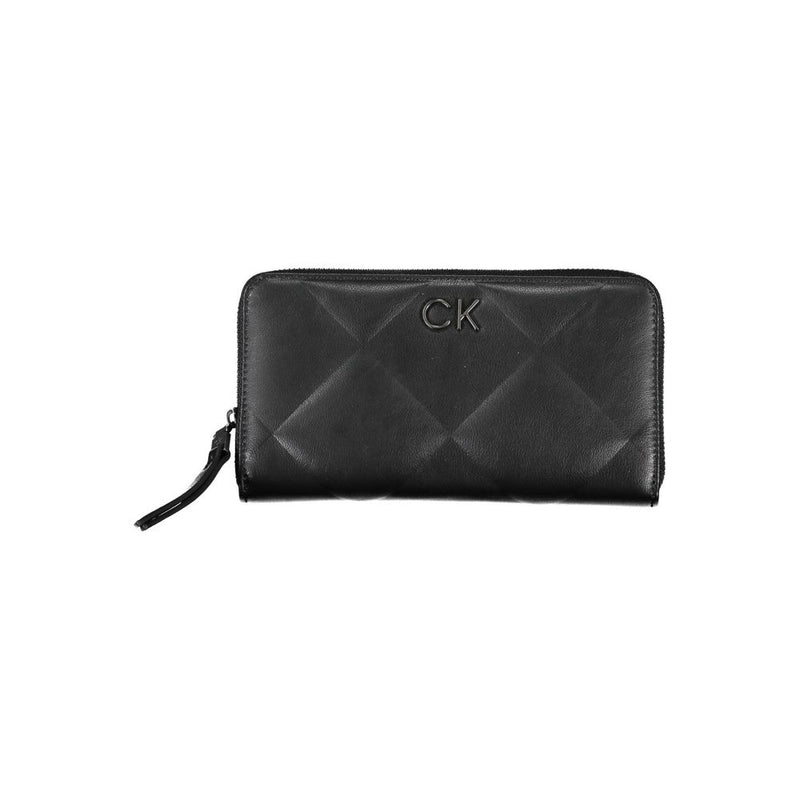 Black quilted synthetic women wallet with zipper and CK logo