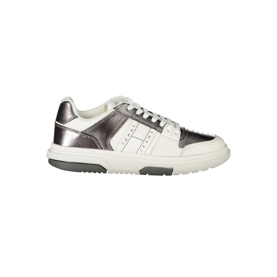 Tommy Hilfiger white and metallic silver polyurethane women’s lace-up fashion sneaker.