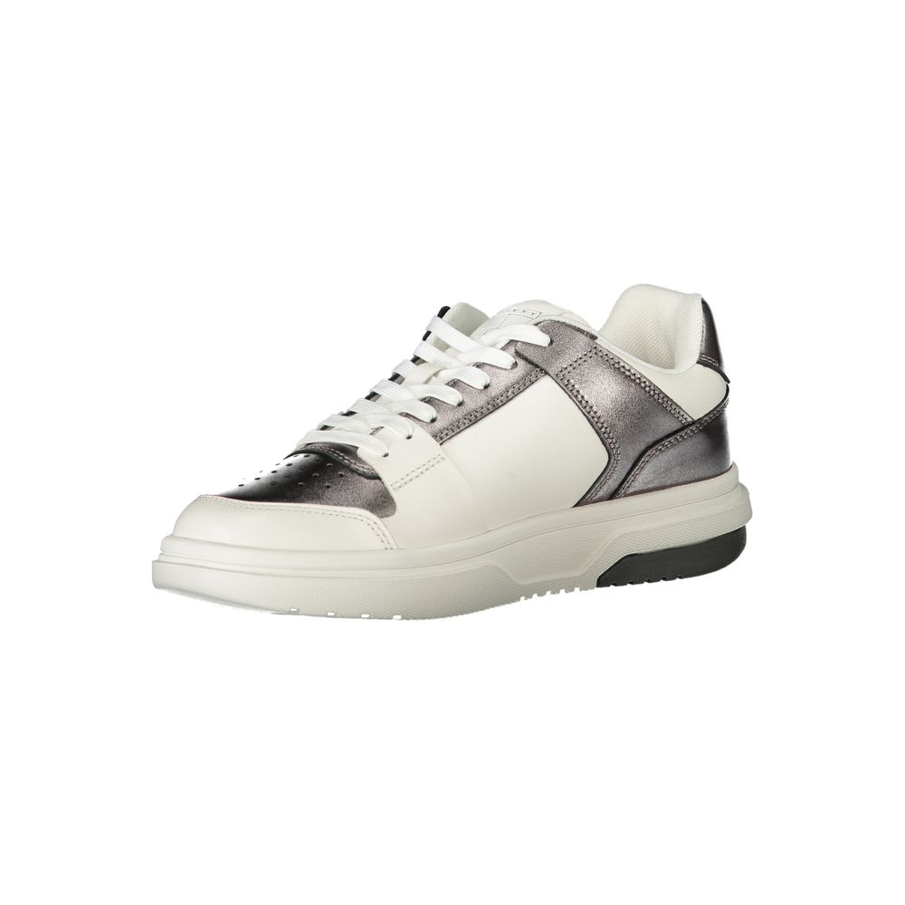 Tommy Hilfiger women's white and metallic silver polyurethane sneakers with a chunky flat sole and lace-up closure.
