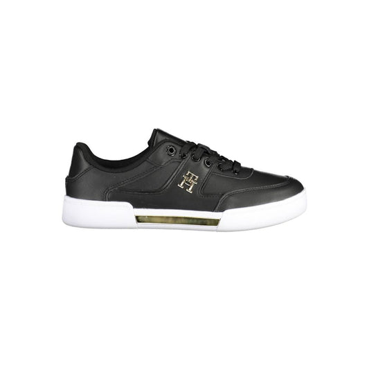 Black Tommy Hilfiger women's sneaker in polyester with gold logo and white sole with gold-tone accents.