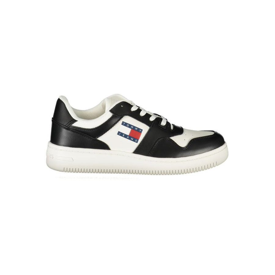 Tommy Hilfiger women's black and white polyurethane low-top sneaker with logo patch.