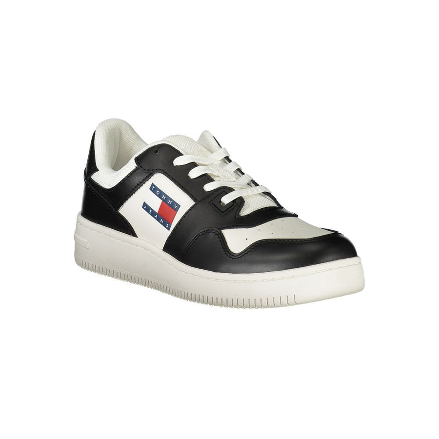 Tommy Hilfiger women's black and white polyurethane low-top sneaker with logo patch.