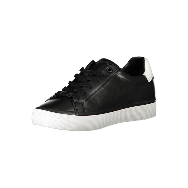 Calvin Klein women's black leather sneaker with black laces, white heel tab, and a white rubber platform sole.