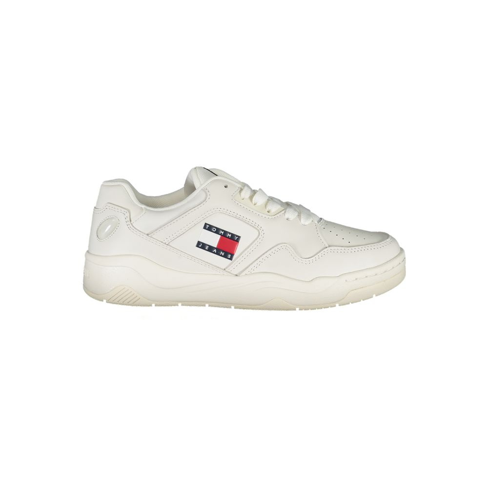 Tommy Hilfiger women’s white polyurethane casual sneaker with side logo patch on a white background.
