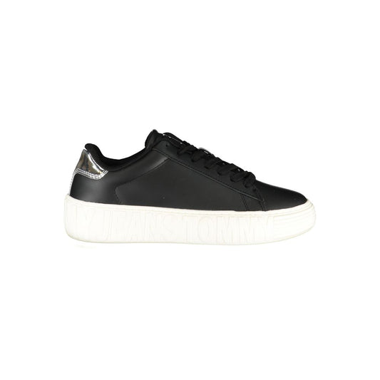 Tommy Hilfiger black leather women's sneaker with silver heel detail and chunky white embossed platform sole.