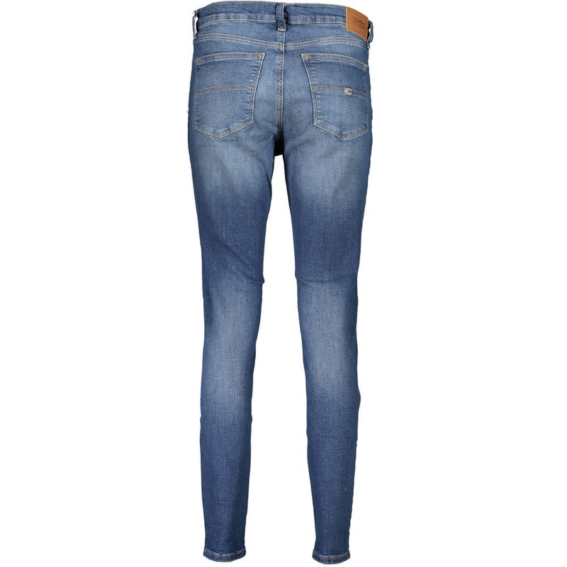 Blue cotton women's skinny jeans from behind showing back pockets and waistband