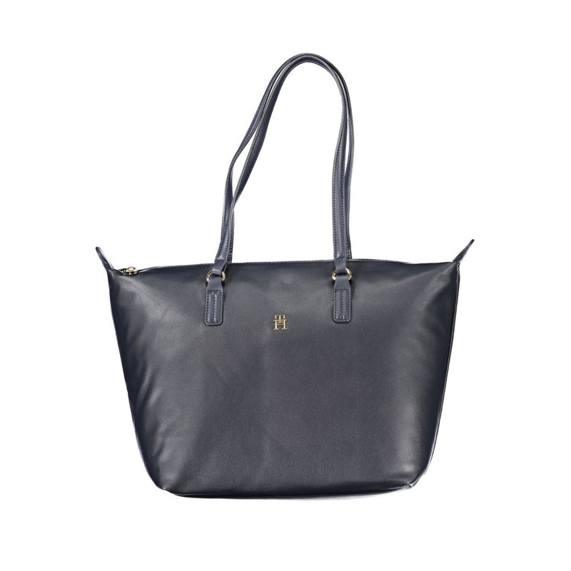Tommy Hilfiger dark blue polyester tote handbag with thin shoulder straps and a gold logo on the front
