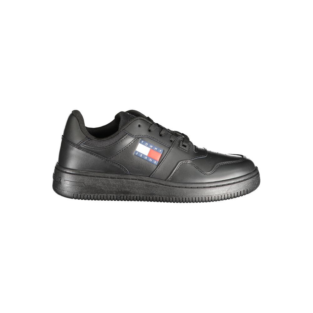 Tommy Hilfiger women's black leather lace-up sneaker with iconic brand flag logo patch on the side.