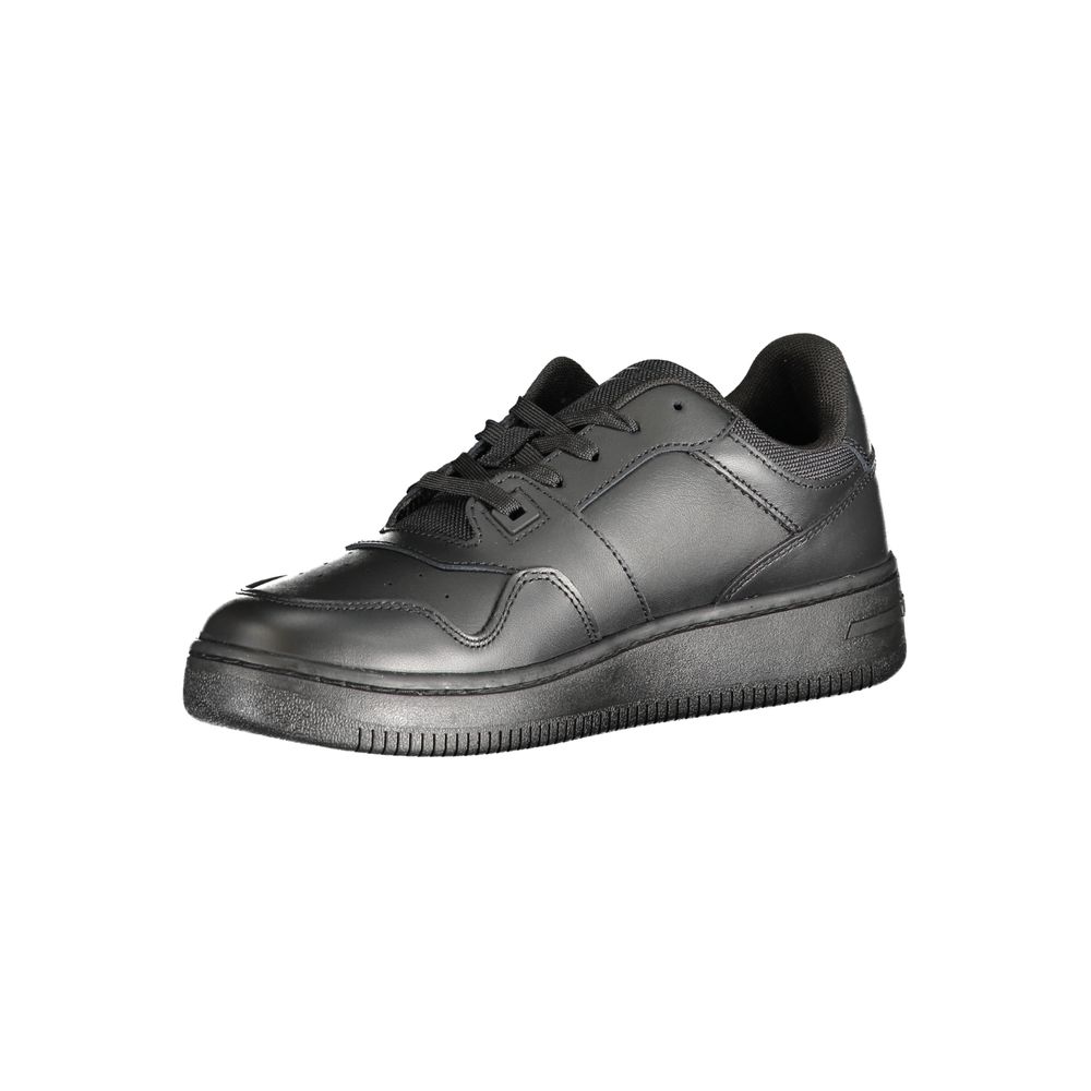 Tommy Hilfiger women’s black leather low-top sneaker with matching black laces and a thick rubber sole.