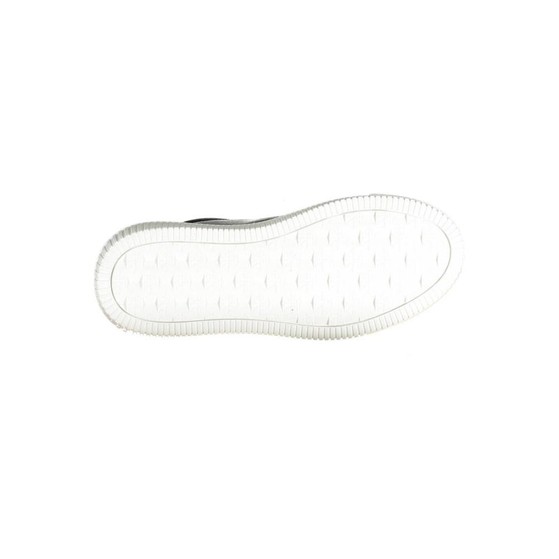 Bottom view of a Calvin Klein black leather women's sneaker with a white textured rubber outsole.