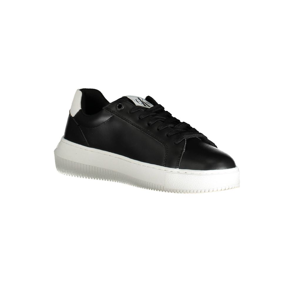 Calvin Klein black leather sneaker with white platform sole, lace-up front, and branded white heel tab.