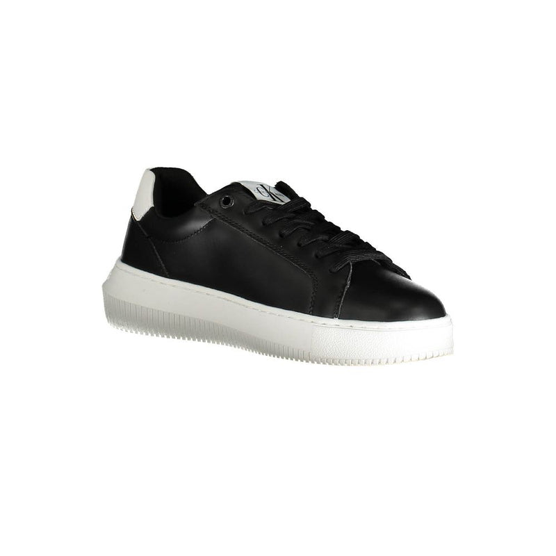 Calvin Klein women's black leather sneaker with white sole and heel tab, featuring a minimalist lace-up style.