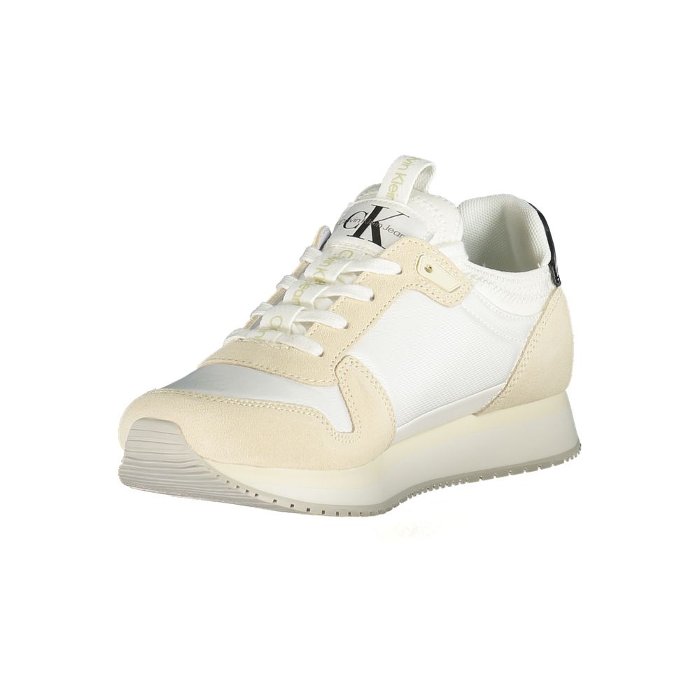 Calvin Klein white polyurethane women’s sneaker with cream suede overlays, lace-up front, and CK logo on tongue.