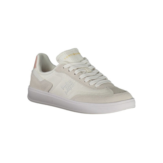 White Tommy Hilfiger women's sneaker in polyurethane and suede with lace-up style.