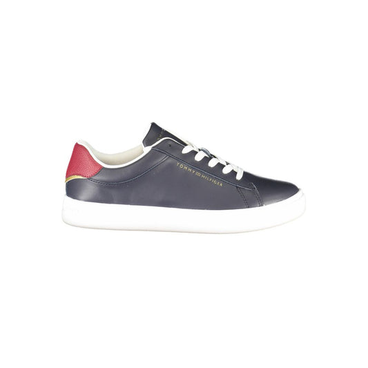 Blue polyurethane Tommy Hilfiger women’s sneaker with white laces, a red heel accent, and a white rubber sole.