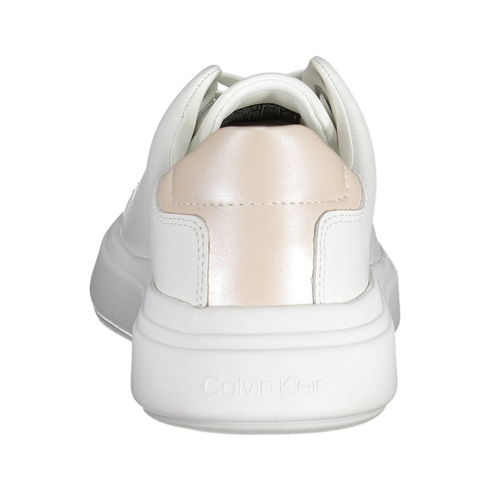 Back view of white Calvin Klein leather sneaker with a metallic pink heel tab and chunky logo sole.