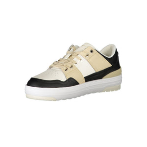 Tommy Hilfiger women's white, beige, and black leather sneaker in a chunky, sporty lace-up style.