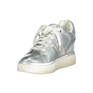Silver metallic polyester women's platform sneaker with white laces and a thick off-white rubber sole.