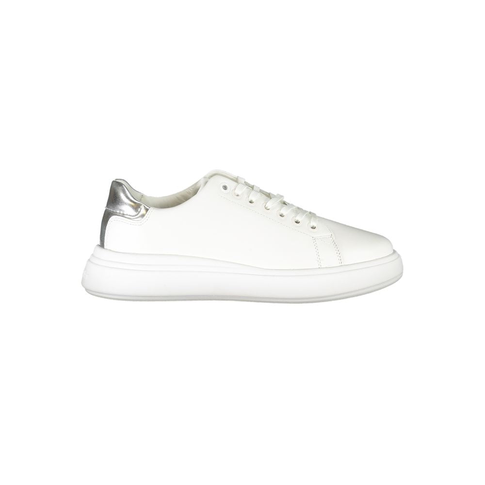 Calvin Klein white leather sneaker with a chunky sole and metallic silver heel accent.