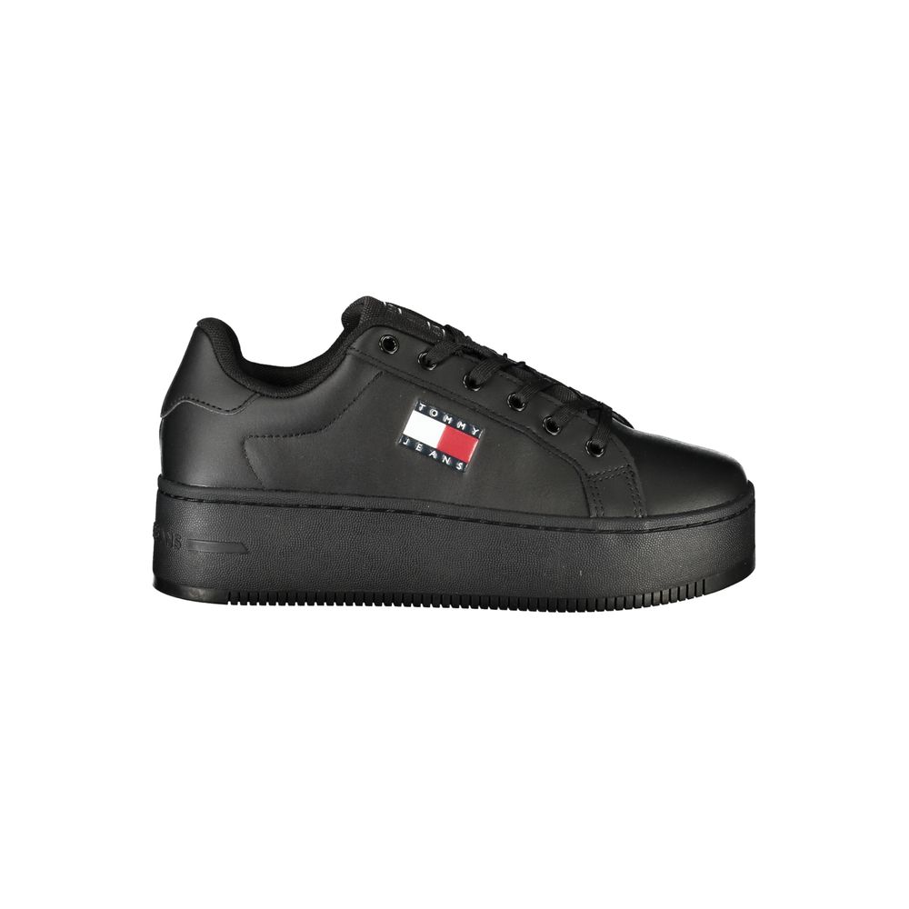 Black sneaker with Tommy Hilfiger logo on a white background
