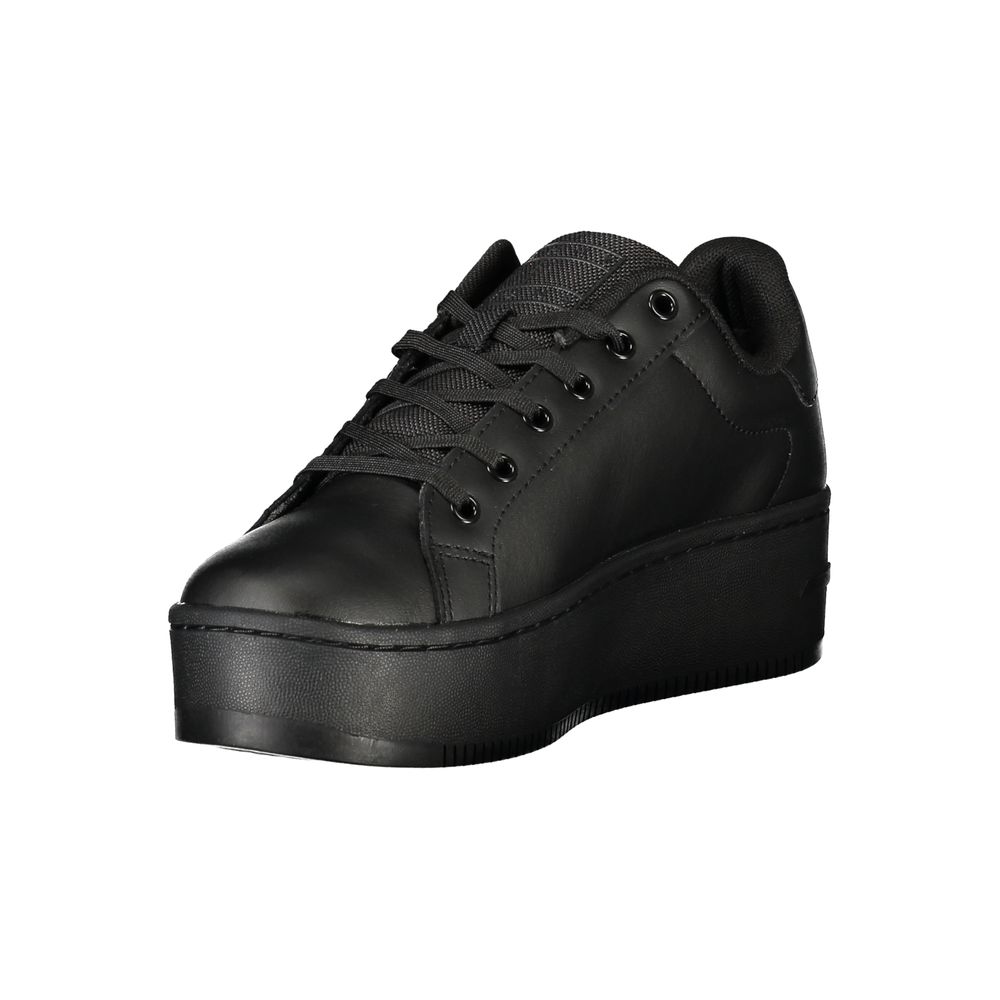 Black platform sneaker on a white background