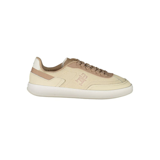 Tommy Hilfiger beige polyurethane women's lace-up sneaker with perforated side panel and logo detailing.