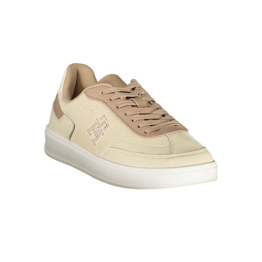 Tommy Hilfiger women’s beige polyurethane lace-up sneakers with a textured design and side logo.
