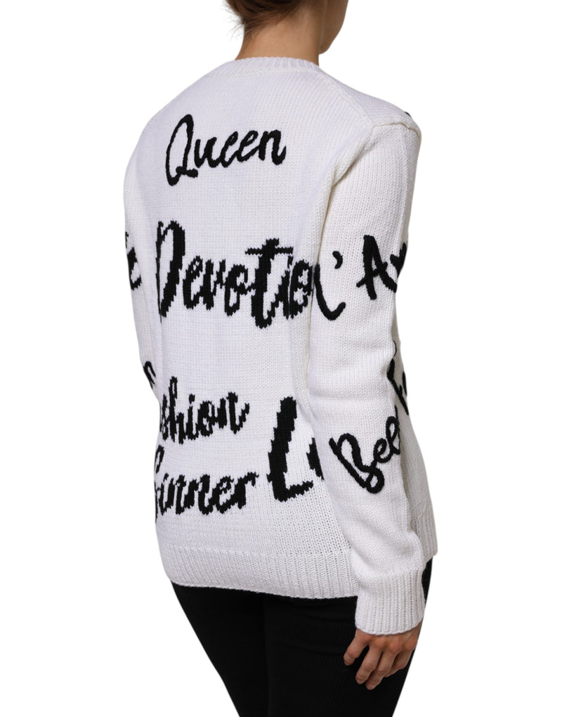 White wool knit crew neck pullover sweater with black text graphics worn from behind