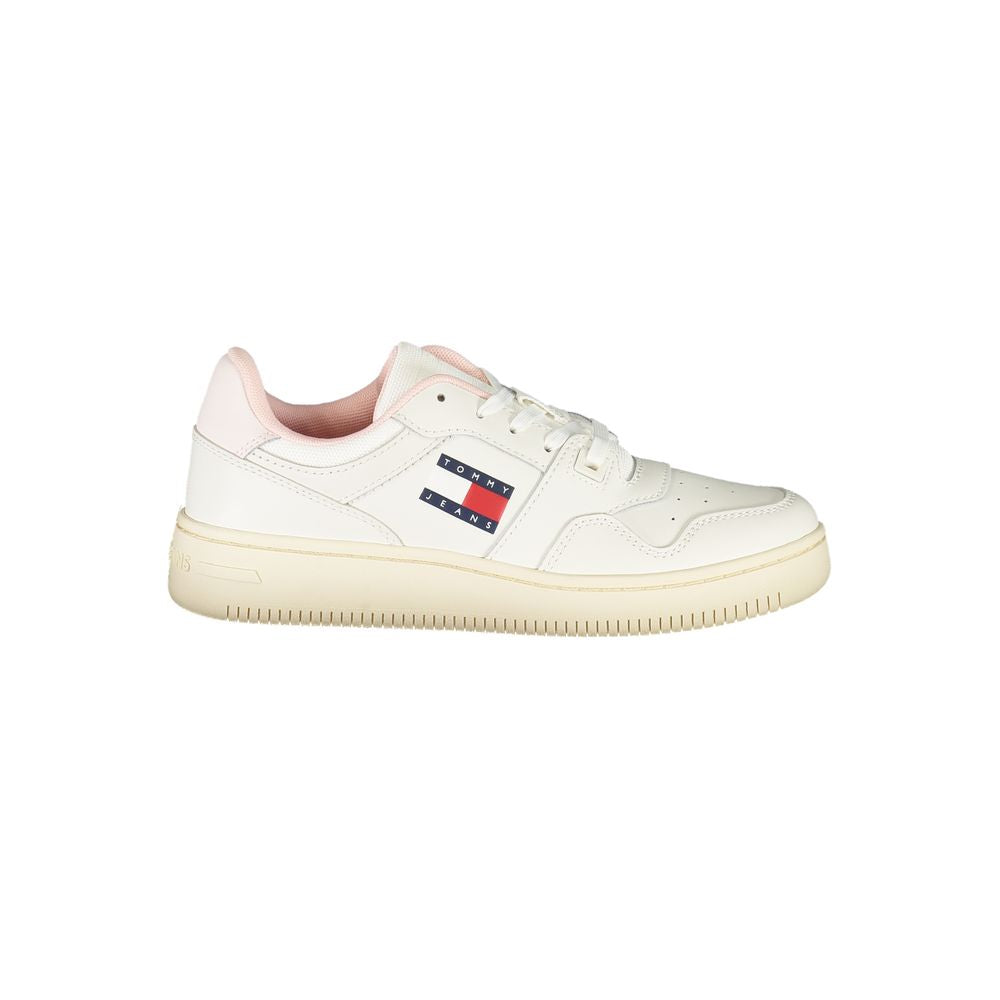 Tommy Hilfiger women’s white leather sneakers with soft pink accents and the brand’s signature logo on the side.