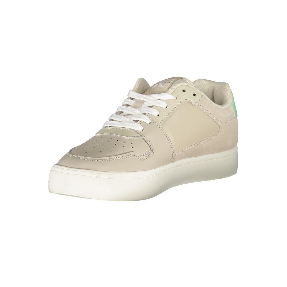 Calvin Klein women's beige polyurethane sneaker, low-top style with white laces and a light green heel tab.