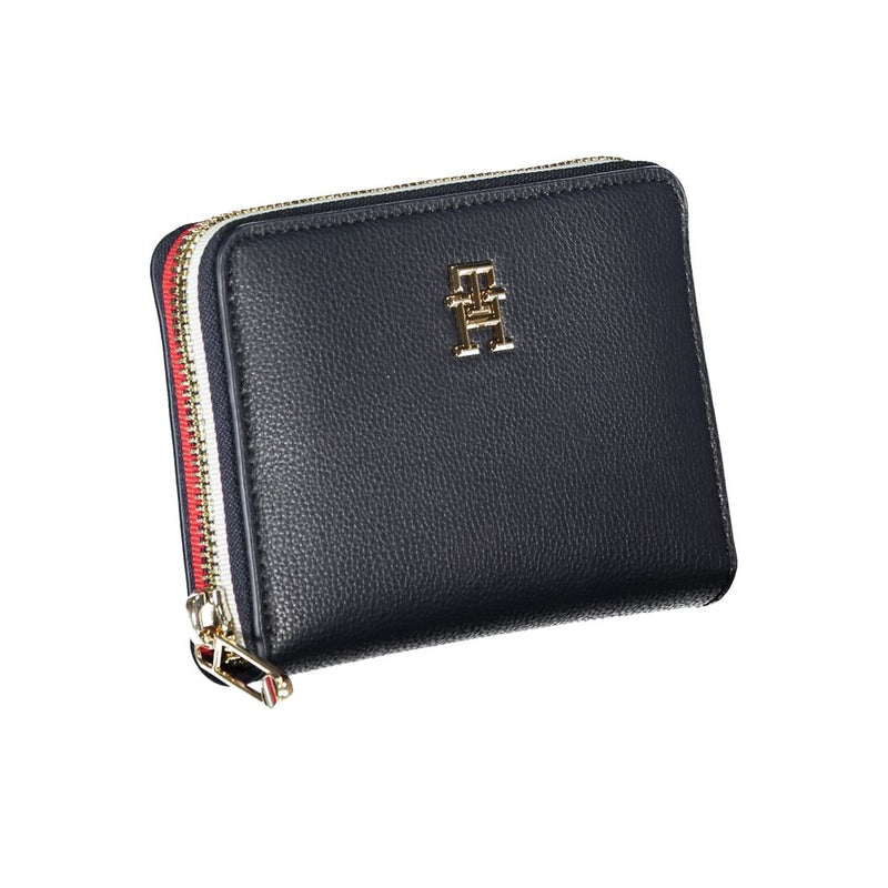 Blue polyurethane women's zip-around wallet with a textured finish and gold logo emblem