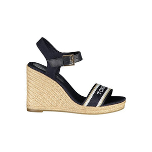 Tommy Hilfiger blue leather and fabric wedge sandal with espadrille platform and buckled ankle strap.