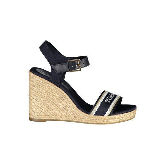 Tommy Hilfiger blue leather and fabric wedge sandal with espadrille platform and buckled ankle strap.