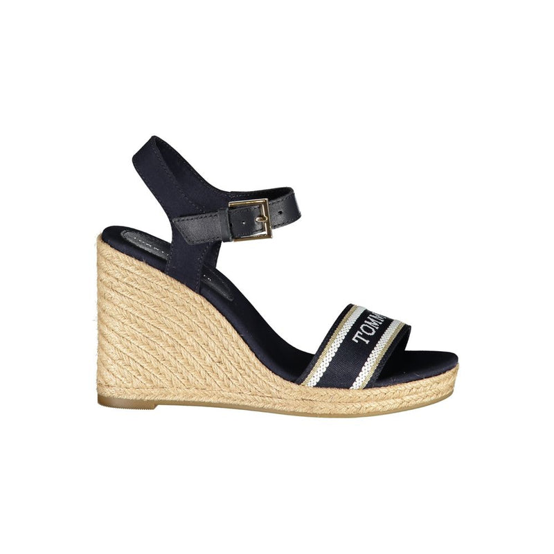 Tommy Hilfiger blue leather and fabric wedge sandal with espadrille platform and buckled ankle strap.