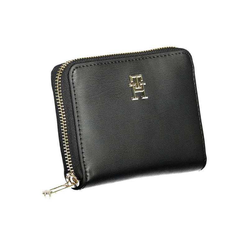 Black polyurethane women zip-around wallet with gold hardware and logo